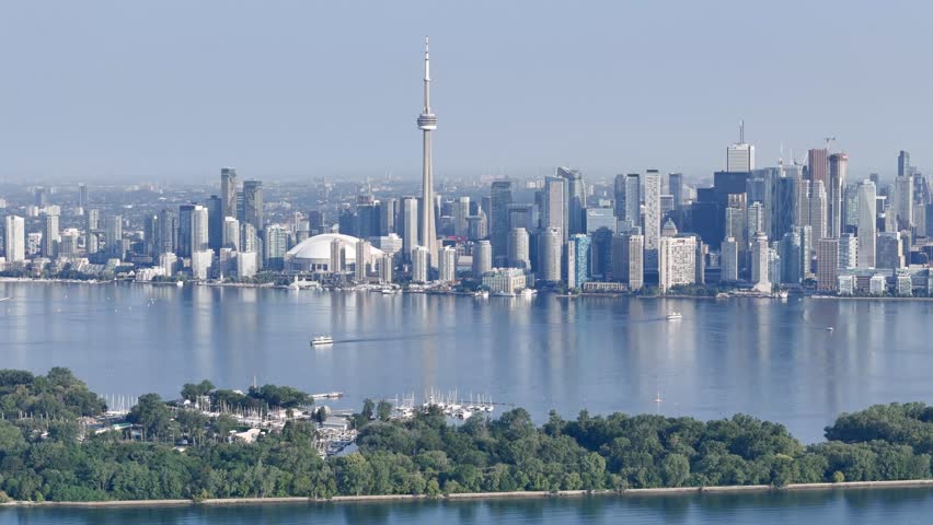 Toronto skyline with CN Tower, waterfront and Toronto Islands at Lake Ontario, aerial cityscape panorama, Canada. g.