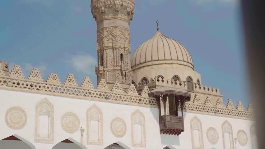 The Great Al Azhar Mosque of Cairo is a historic landmark of Arabic architecture featuring a towering minaret and elegant dome against the Egyptian sky for travelers seeking religious culture