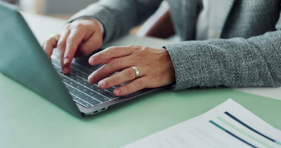 Business, hands and laptop with financial man at desk in office for accounting report or review. Computer, finance and typing with corporate employee in workplace for investment or wealth management