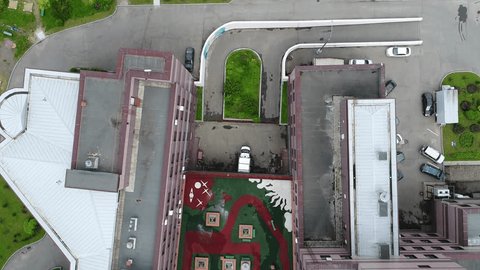 Drone Flying Backward above Roof Medical Center
