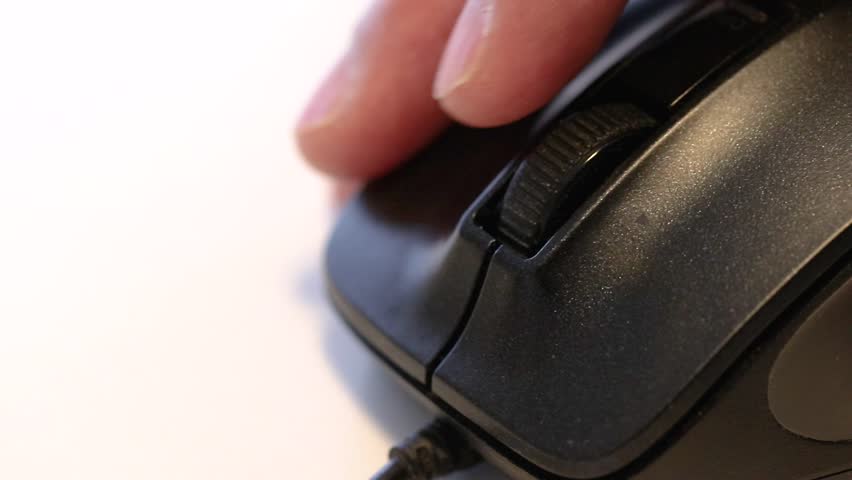 Spinning the wheel on a computer mouse with a finger