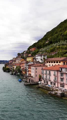 Gandria shores of Lake Lugano Ceresio in Switzerland vertical video aerial drone