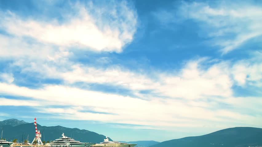 Serene mountain lake landscape with clear blue sky and pristine natural scenery