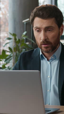 Caucasian businessman typing laptop speaking video call in office writing notes male manager HR employee entrepreneur CEO online meeting business man guy conference negotiations workplace corporate