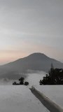 High-resolution vertical video capturing a calm morning atmosphere in an urban area. Soft sunrise light, natural colors, and peaceful environment create a cinematic and relaxing mood. Suitable for themes such as daily life, morning routine, urban lifestyle, travel, cityscape, and background visuals. - Powered by Shutterstock - Get 15% off with code: PIKWIZARD15