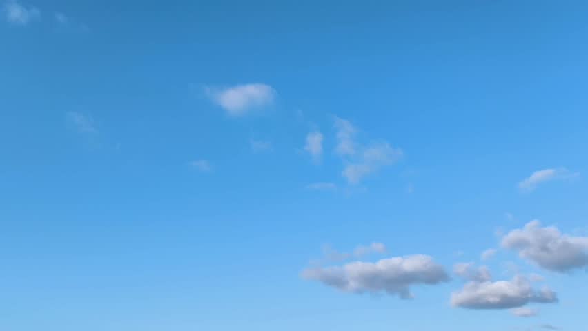 Small clouds moving at twilight