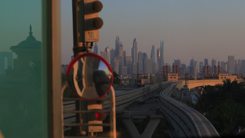 City views, Metro and rails. Skyscrapers and roads, streets and buildings. On the streets of Dubai, in a public place.