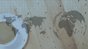 Spinning globe and world map with data processing over close up of a coffee cup on a wooden surface. Computer interface and business technology concept - Powered by Shutterstock - Get 15% off with code: PIKWIZARD15