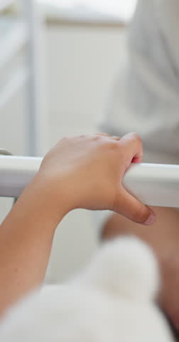 Father, child or holding hands in hospital for support, pediatric healthcare or healing for surgery. Sick patient, love or person with kid for medical treatment, comfort or compassion for recovery