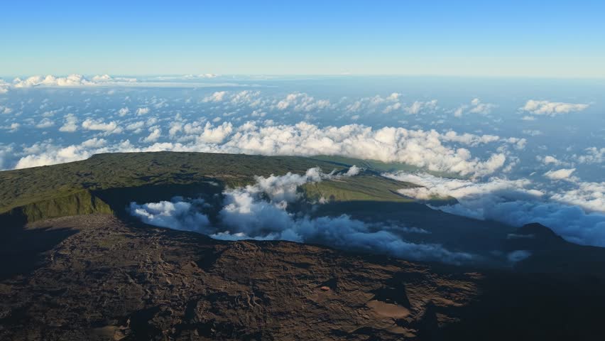 Scenic drone flight landscape of Piton de la Fournaise (Peak of the Furnace) 2632m, a shield volcano on the eastern side of Reunion island in the Indian Ocean