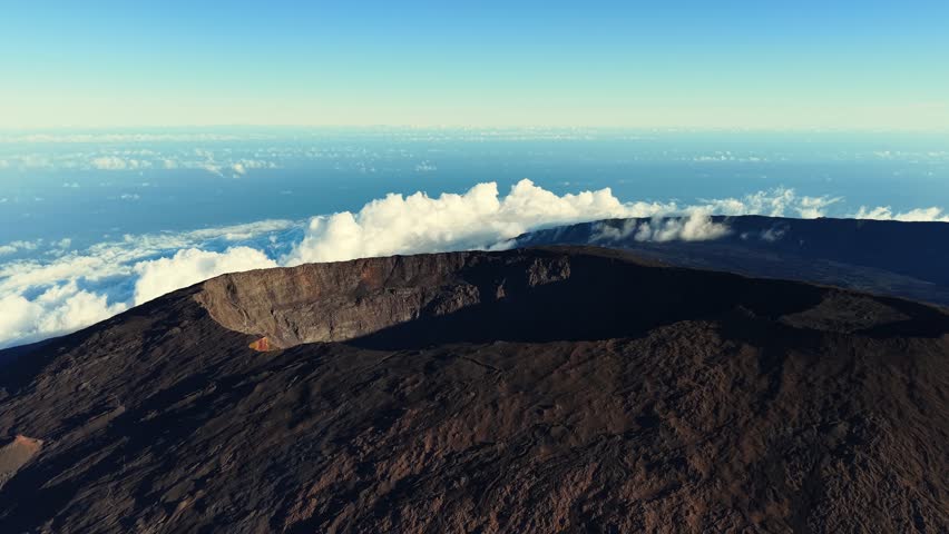 Scenic drone flight landscape of Piton de la Fournaise (Peak of the Furnace) 2632m, a shield volcano on the eastern side of Reunion island in the Indian Ocean