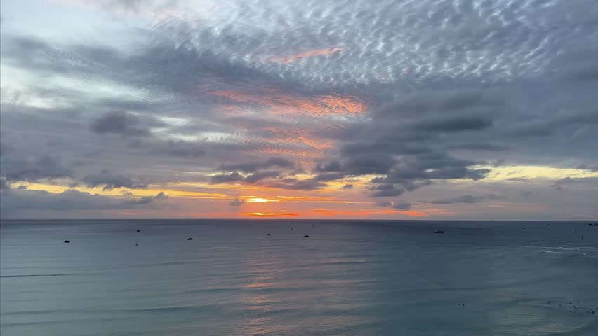 Cloudy sunset on Waikiki Beach in Hawaii