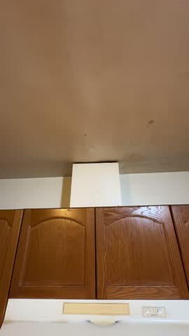 Interior Vintage Kitchen Cabinets with Aged Wood Finish and Classic Rustic Design Detail