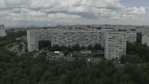 Drone Tracking Sideways above Urban Neighborhood