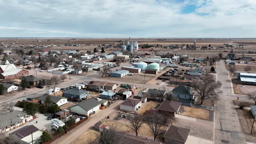 Pierce Colorado drone flight toward grain silos eastward toward the grasslands.