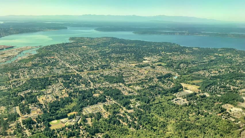 Aerial view of Seattle-Tacoma International Airport and the Port of Tacoma in late August 2025