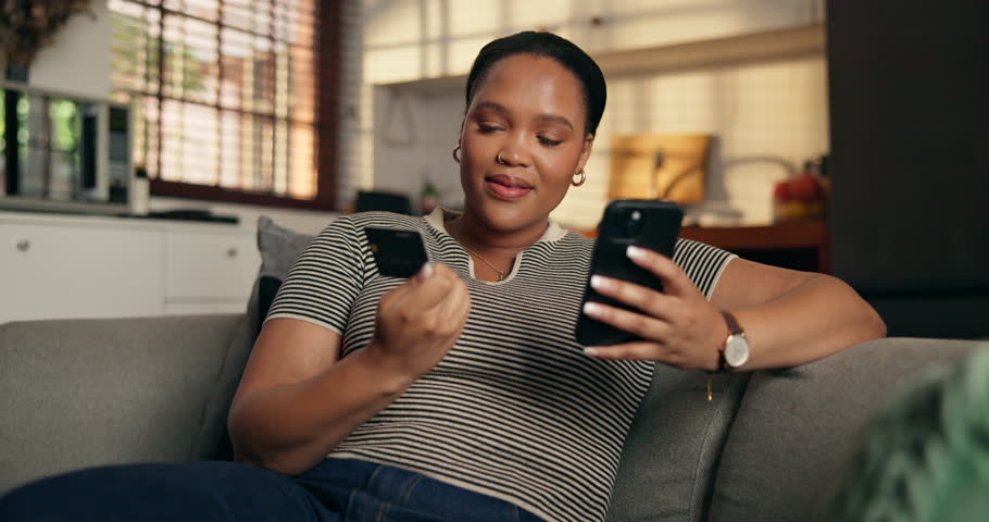 Credit card, happy and black woman on sofa with phone for online shopping, website store and purchase. Home, relax and person with bank app for ecommerce, payment and digital subscription for sale