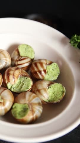 Escargot food green butter French cuisine food tasty snack fresh gourmet food background on the table rustic food top view copy space