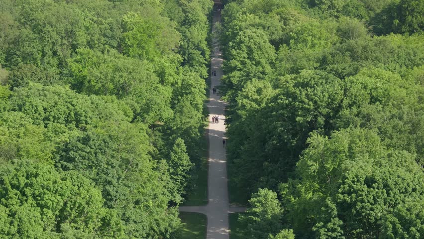 City Berlin Tiergarten sidewalk in the park View from victory column City Berlin Germany Europe Sommer may 9th 2024