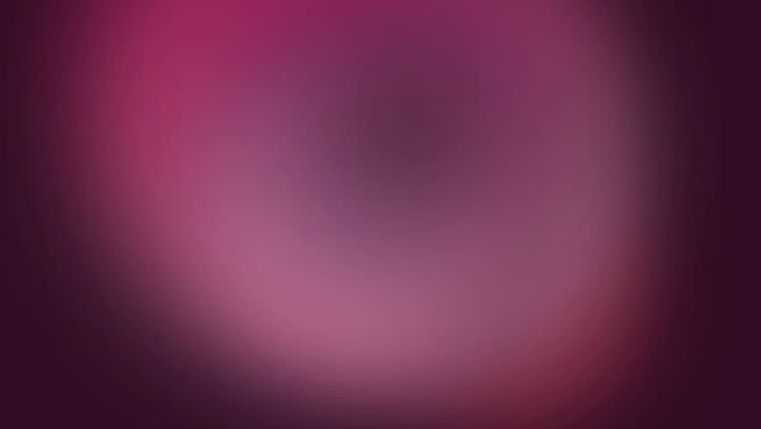 Soft pink and purple blurred swirl with gentle lighting creating a dreamy abstract scene and smooth transitions in a dark background