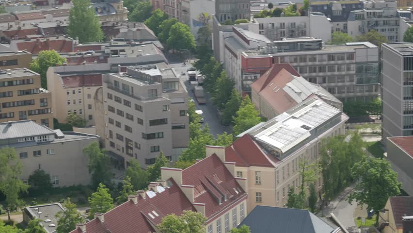 Emergency response vehicles and urban buildings at city street in Berlin