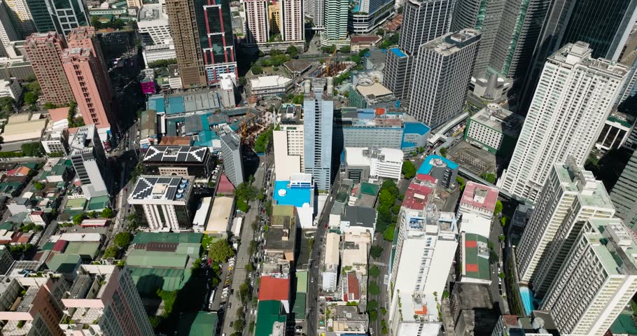 Drone view of Buildings and Business districts in Metro Manila. Makati Cityscape. Philippines.
