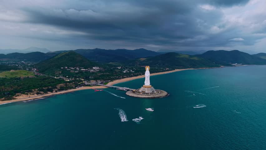 GuanYin buddhism statue at seaside in Nanshan center of Sanya, Hainan island China, Aerial view.