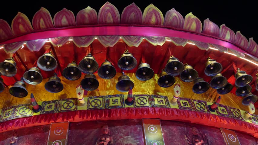 Colorful Temple Bells with Swastika Motif
