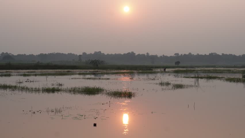 Sunset Over Flooded Wetland Plain