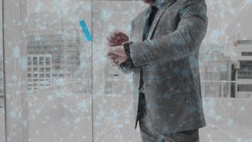 Animation of heart and like icons, connected dots over caucasian businessman using smartwatch. Digital composite, multiple exposure, social media, time, communication and technology. - Powered by Shutterstock - Get 15% off with code: PIKWIZARD15