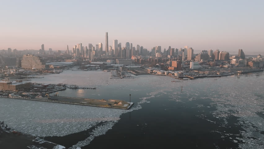Aerial view of the Brooklyn Navy Yard. Shot above a frozen East River at sunrise.