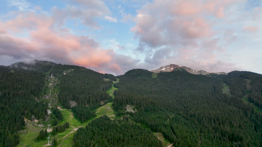 Whistler Creekside Sunset Aerial with Alpine Ski Runs and Coast Mountains, British Columbia