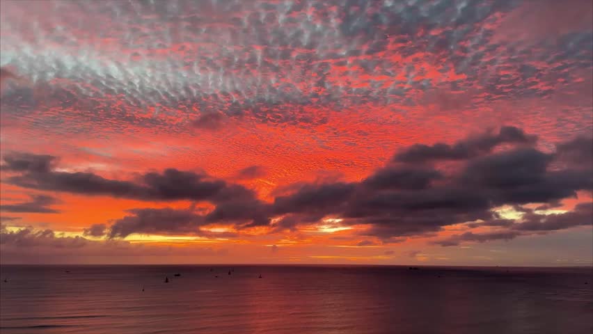 Beautiful orange sunset on Waikiki Beach in Hawaii