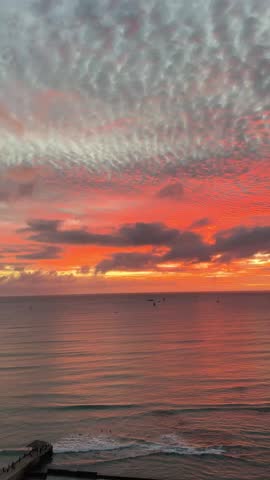 Beautiful orange sunset on Waikiki Beach in Hawaii