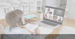 Boy picking green pencil and taking notes for online education, with transparent data overlays. E-learning, remote, youthful, digital, communication, interactive, modern - Powered by Shutterstock - Get 15% off with code: PIKWIZARD15