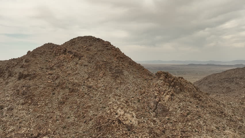 Joshua Tree Aerial Shot of Desert Canyon Forward California USA - Filmed outside national park