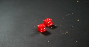 Animation of stars falling over dices. Casino, gambling and digital interface concept digitally generated video. - Powered by Shutterstock - Get 15% off with code: PIKWIZARD15