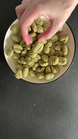 Gnocchi with spinach tasty snack fresh gourmet food background on the table rustic food top view copy space vegetarian and vegan food marketing concept photo
