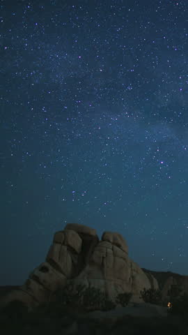 Vertical Shot of Joshua Tree National Park Milky Way Galaxy Over Busy Hidden Valley Astrophotography Time Lapse California USA