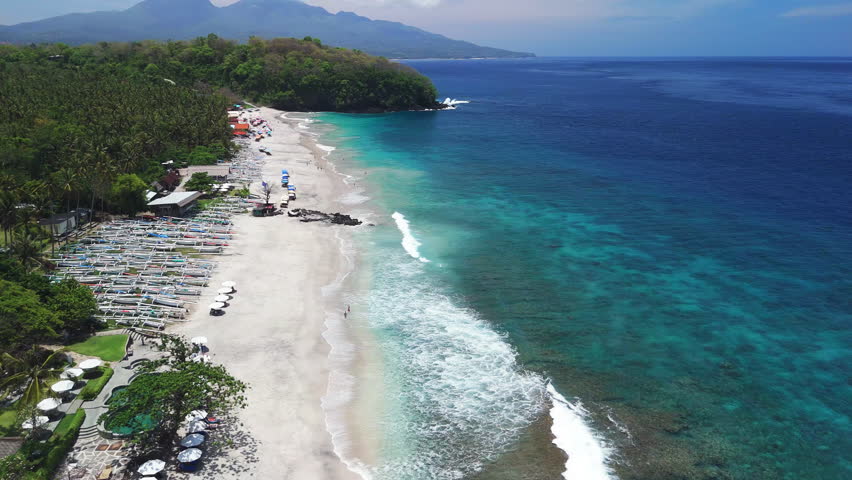 Above view of Virgin beach with ocean waves, paradise tropical coastline