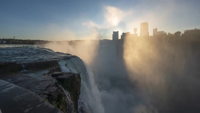 Niagara Falls, New York, USA from the rim of the falls on an autumn dusk.