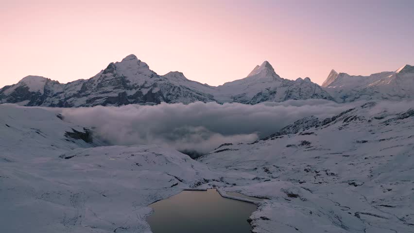 Lake Bachalpsee with Jungfrau, Eiger, and Monch Peaks after an early snow.
