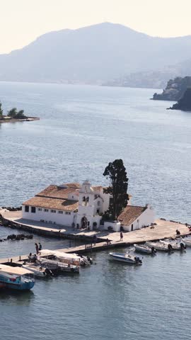 Holy Monastery of Panagia Vlacherna, Kanoni, Corfu Island, Kerkyra, Greece, with Ionian sea and Pontikonissi island, beautiful summer sunny day