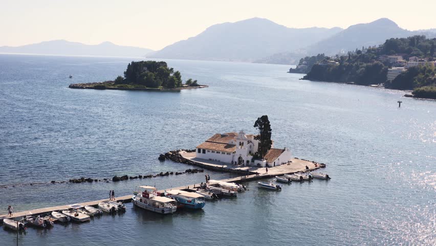 Holy Monastery of Panagia Vlacherna, Kanoni, Corfu Island, Kerkyra, Greece, with Ionian sea and Pontikonissi island, beautiful summer sunny day