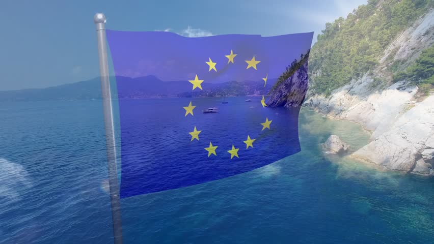 EU flag fluttering and rippling on pole translucent revealing seascape due to light breeze. Banner, emblem, ensign, stock, advertising, sunlit, maritime
