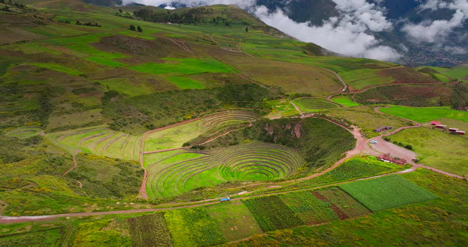 Moray Inca ruins in Peru looking shaped like circular terraced bowl, aerial view