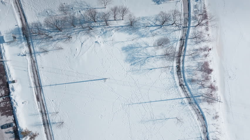 Aerial view of snowy park in Port Credit, Mississauga, serene winter scene