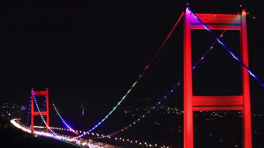 Istanbuls second bridge nightly light show. Colorful lighting of FSM bridge.