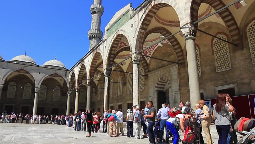 ISTANBUL - MAY 16: Crowd of tourists wait their turn to visit Blue Mosque on May