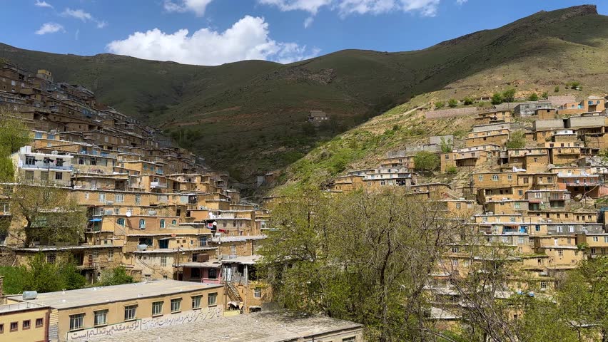 cloud shadow rise on mountain blue sky white cloud village Iran Kurdish people nature Kurdistan vivid peaceful scenic stepped brick rugged slope Zagros stone traditional architecture terrace courtyard